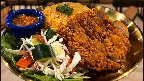 Devil Spicy Chicken Kebab plate with slaw and sauce